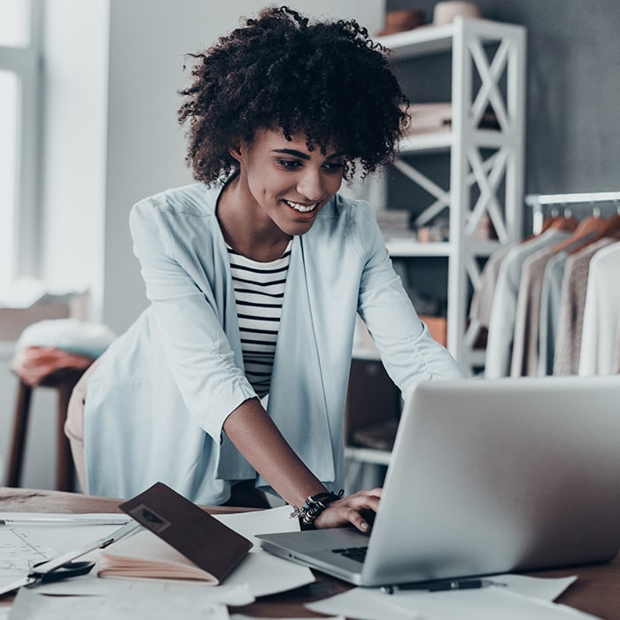 Young Businesswoman on Laptop