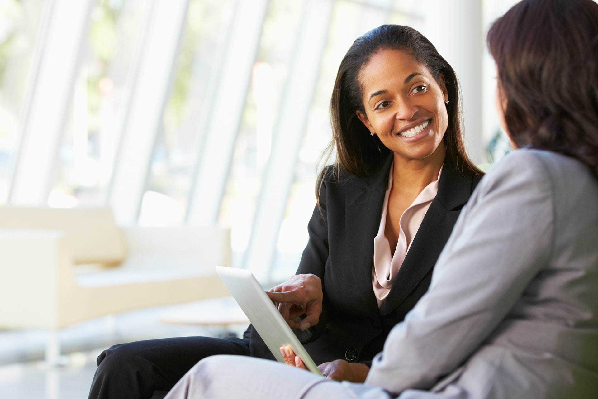 Businesswomen on Tablet