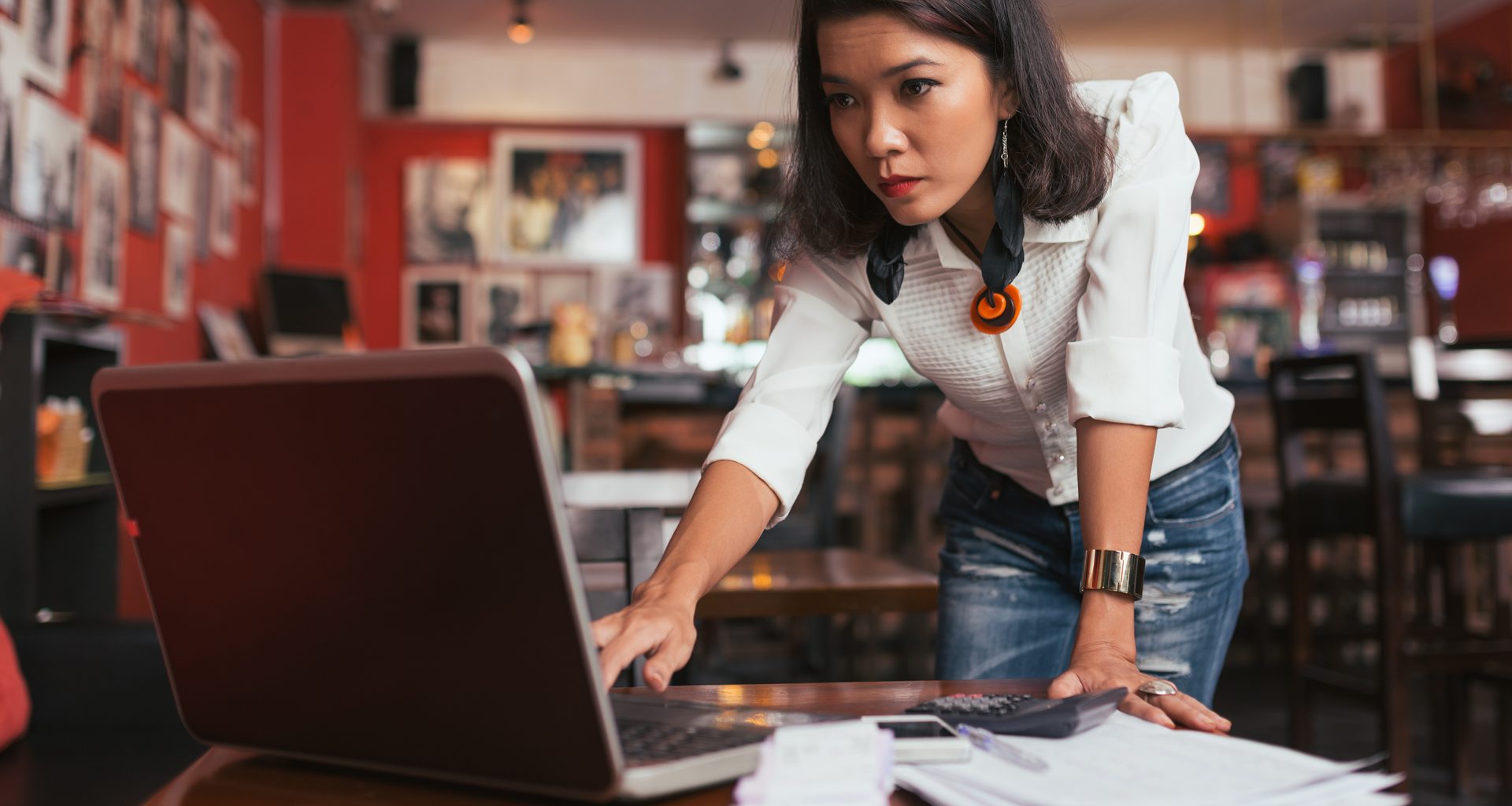 Woman doing business banking on laptop