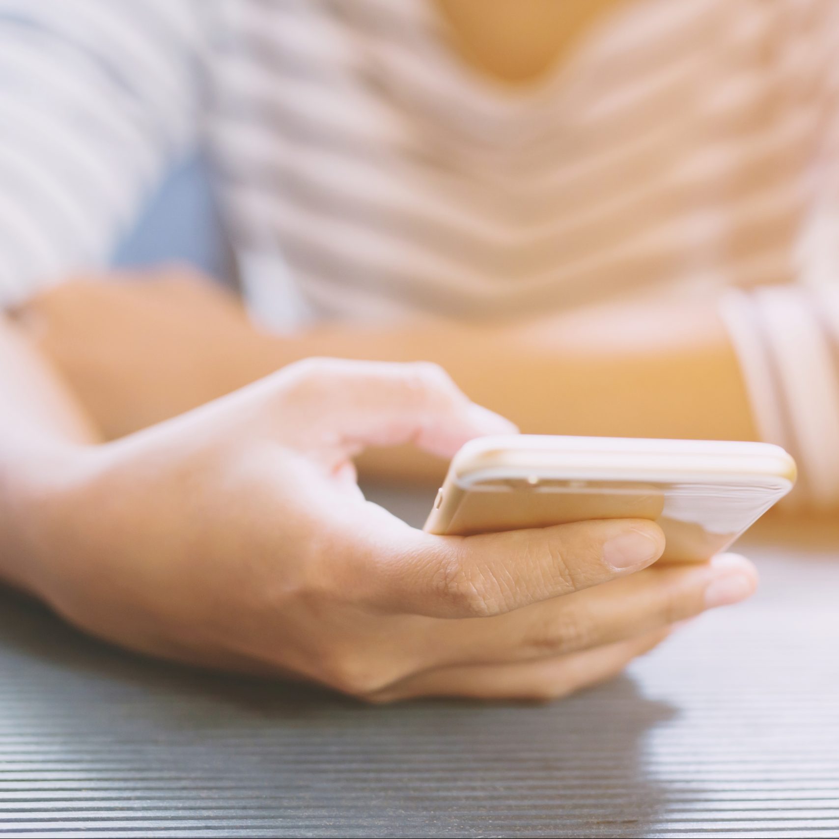 person holding a cell phone in their hand